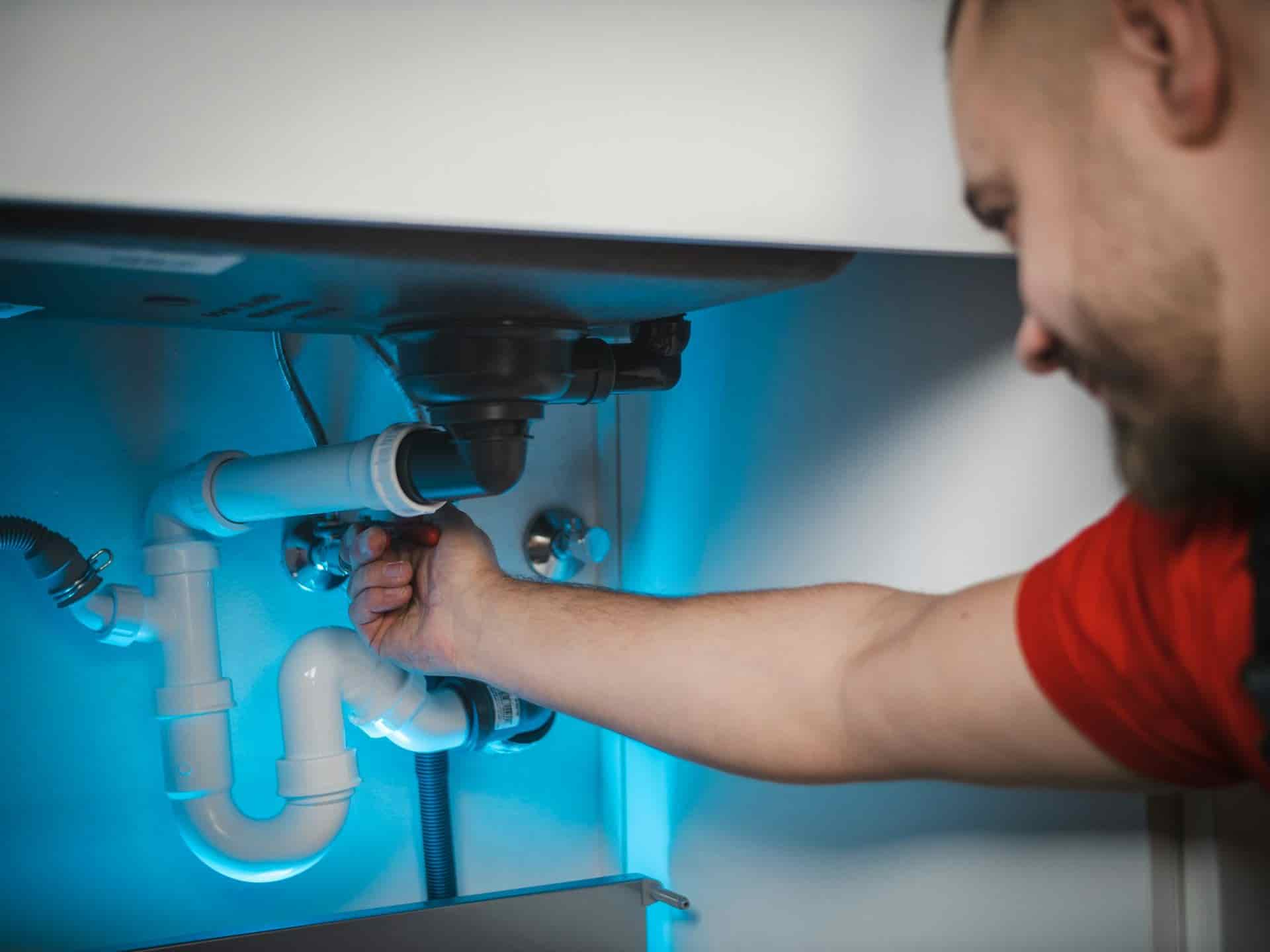 Plumber on a job, the kind of trade Local Services Ads are built for