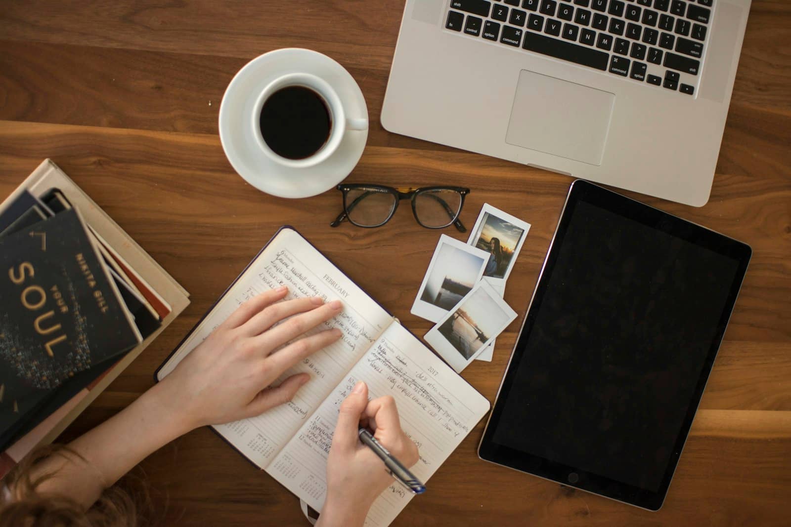 A modern workspace with a laptop, where search and AI research happen side by side