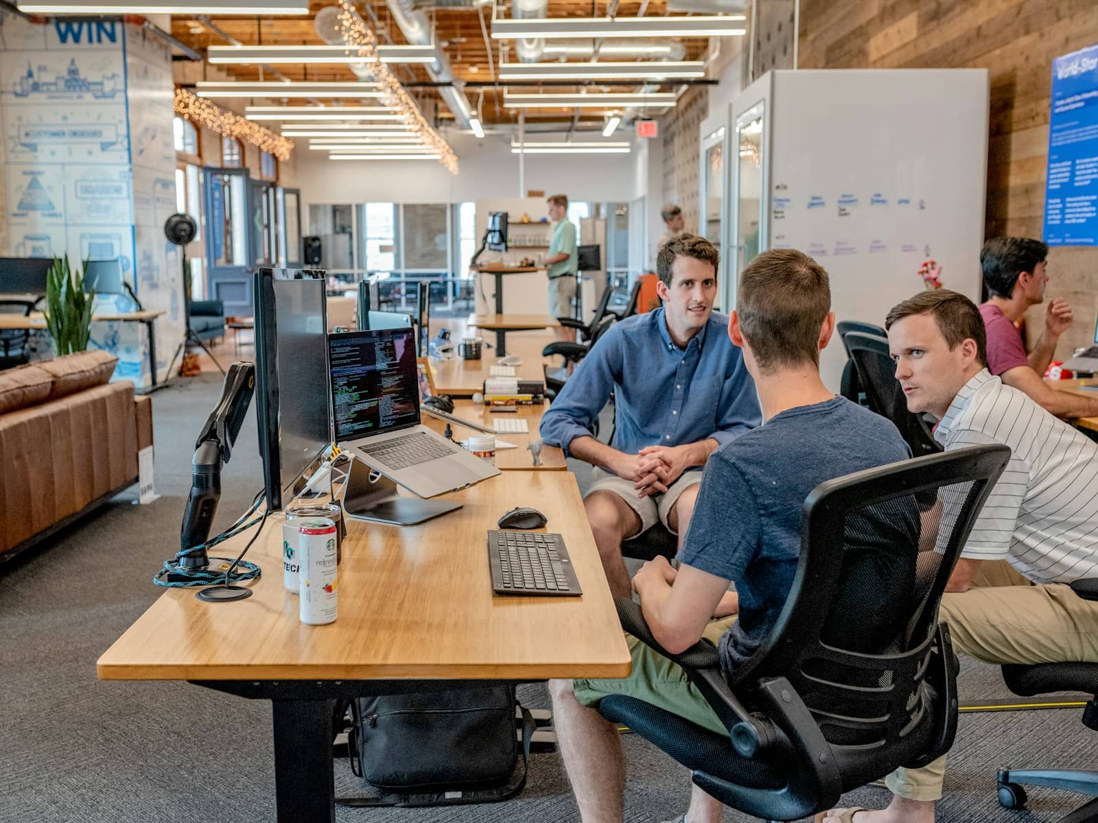 Small business team working together at a desk