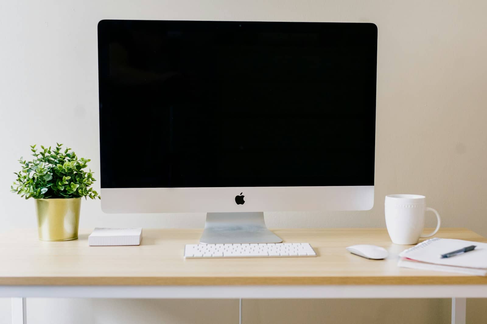 Modern workspace with a laptop on a clean desk