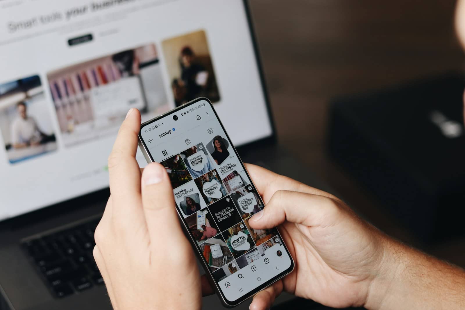 A person managing social content from a laptop